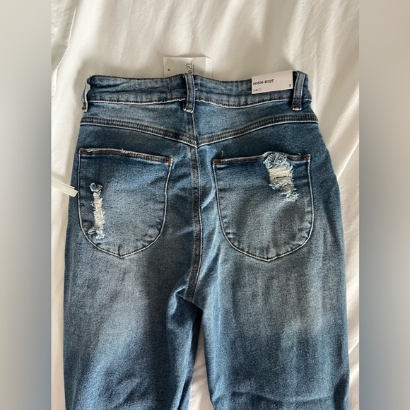 High-rise, Distressed flared jeans - Picture 4 of 5